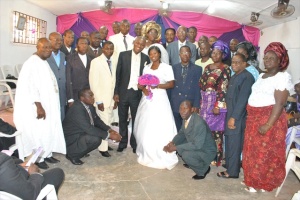 VICTOR & JENNIFER UYANWANNE WITH PASTORS AND DEACONESSES PRESENT AT THE WEDDING